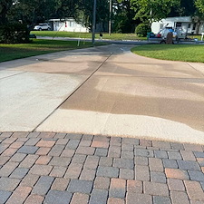 Algae-covered-brick-and-tire-mark-driveway-in-Fort-WaltonFL 0